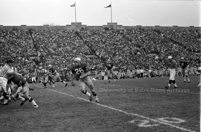 Rocky Bleier, ’68 runs with the ball during the Irish’s game against Navy in 1967.
