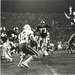 The Irish offensive line rushes the Miami quarterback during the 1984 game at Notre Dame Stadium.