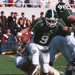Courtney Watson (’04) sacks Michigan State quarterback Jeff Smoker during the 2002 contest at Spartan Stadium.